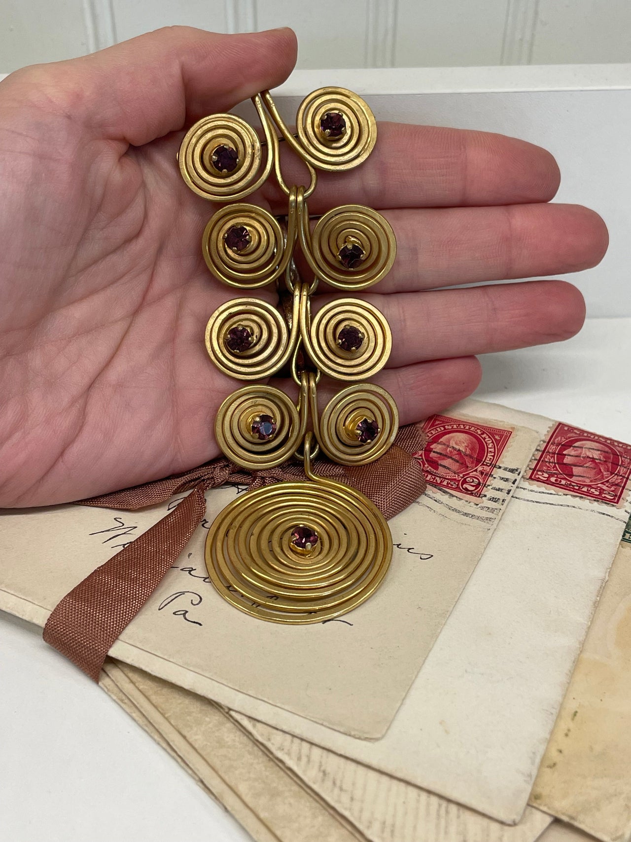 1970’s Matte Gold Spiral Brooch with Purple Rhinestones Devil's Details 