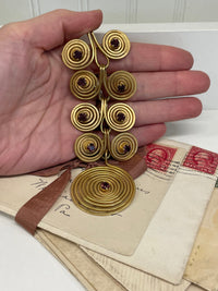 Thumbnail for 1970’s Matte Gold Spiral Brooch with Purple Rhinestones Devil's Details 