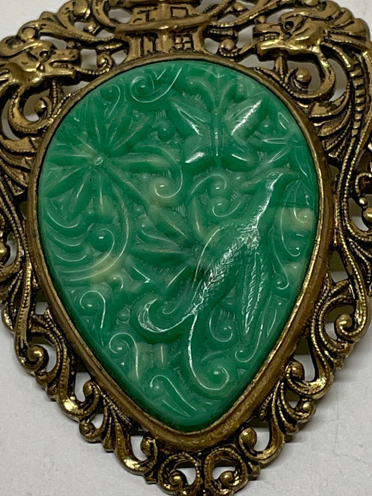 Brass and Plastic Green Carved Brooch/ Pendant Bloomers and Frocks 