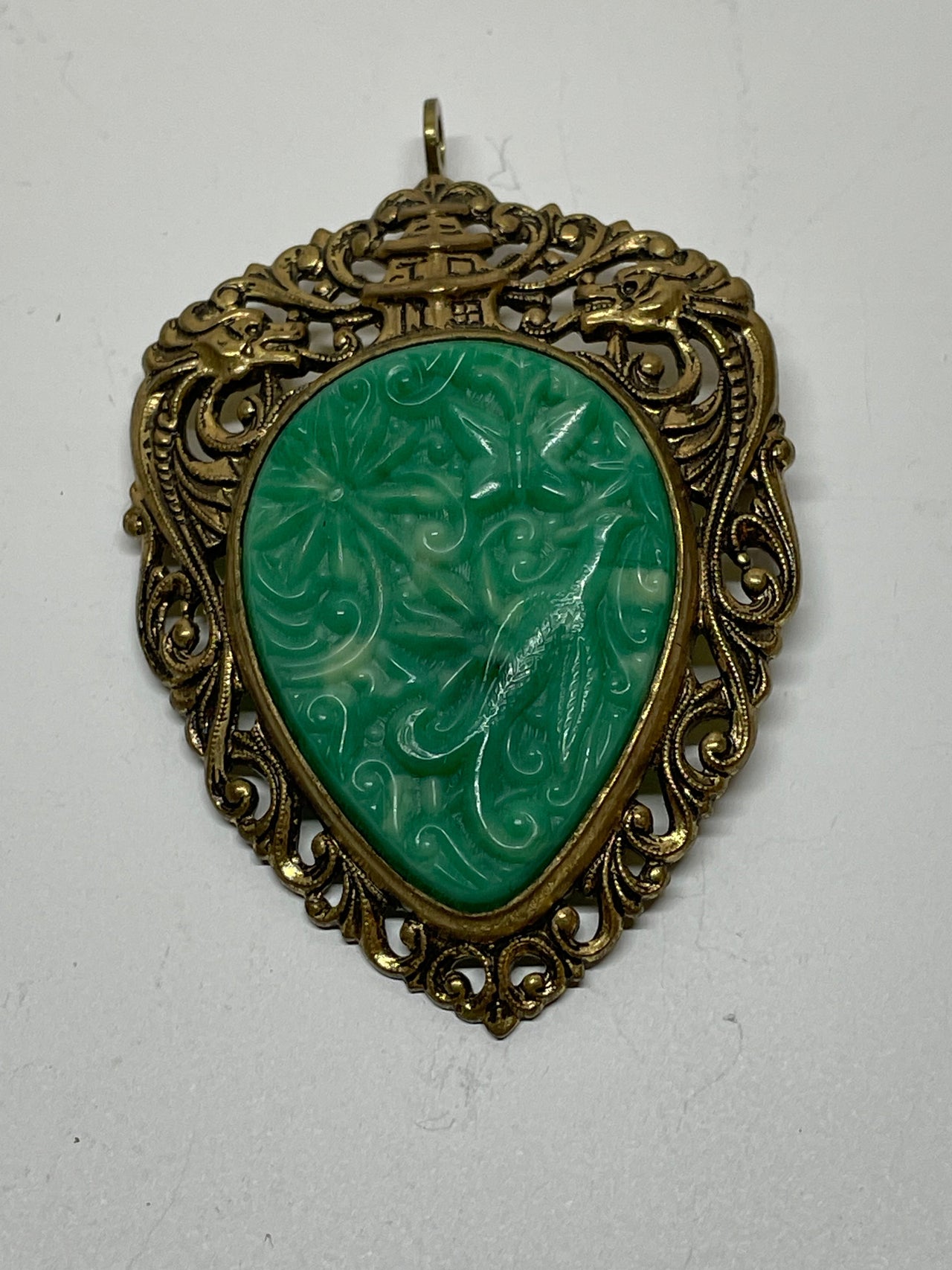 Brass and Plastic Green Carved Brooch/ Pendant Bloomers and Frocks 