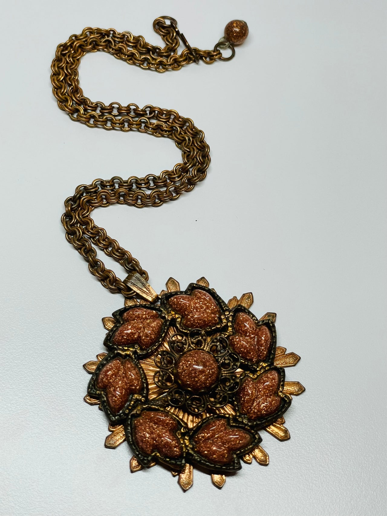 Copper Circle Leaf Pendant with Gold Stone Devil's Details 