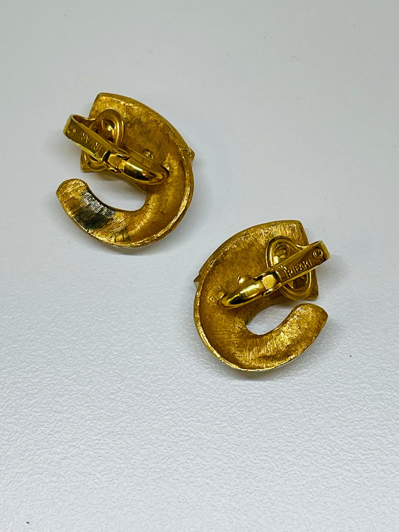 Trifari White and Gold Buckle Earrings Devil's Details 