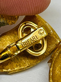 Thumbnail for Trifari White and Gold Buckle Earrings Devil's Details 