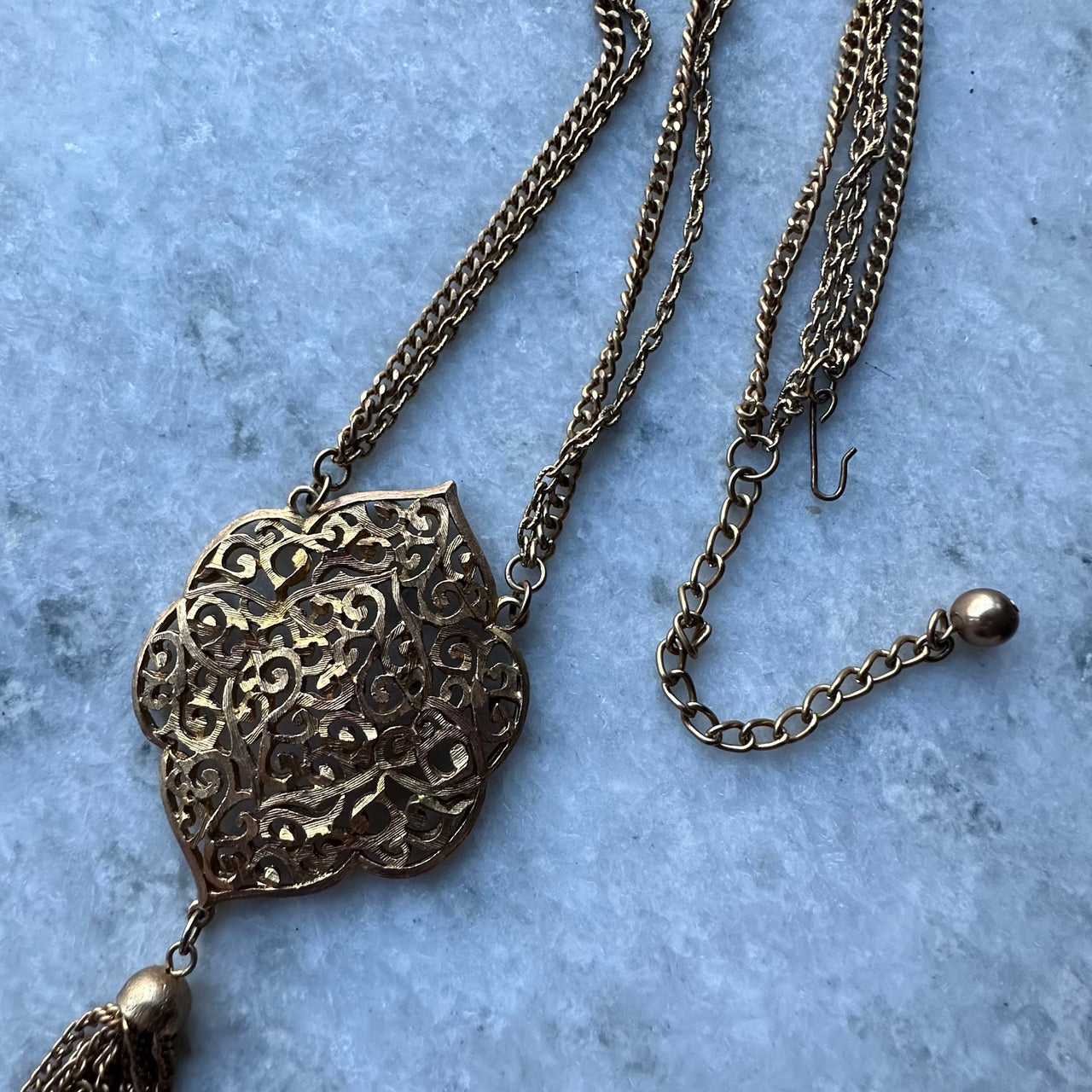 Gold Medallion With Tassle Pendant Bloomers and Frocks 